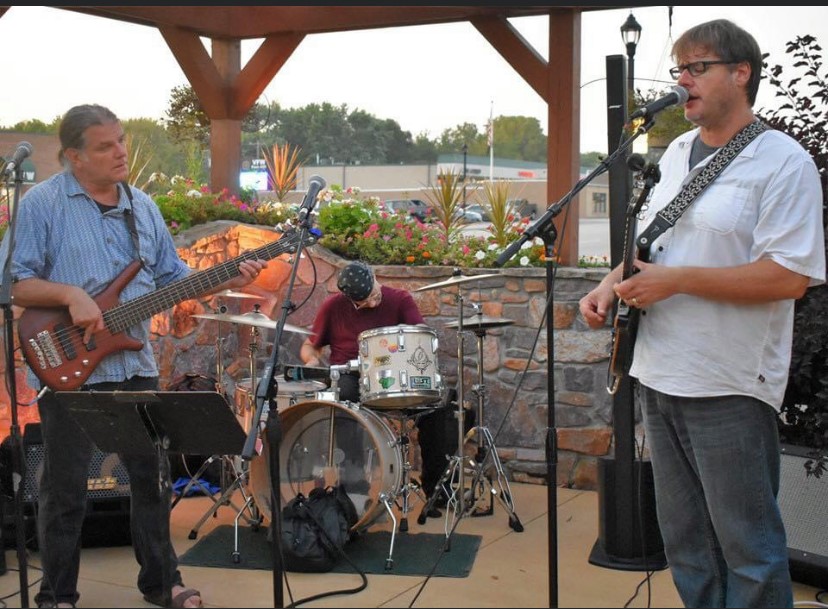 Musicians performing on the Park Tavern patio