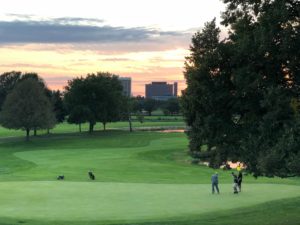 view of the golf course at sunset