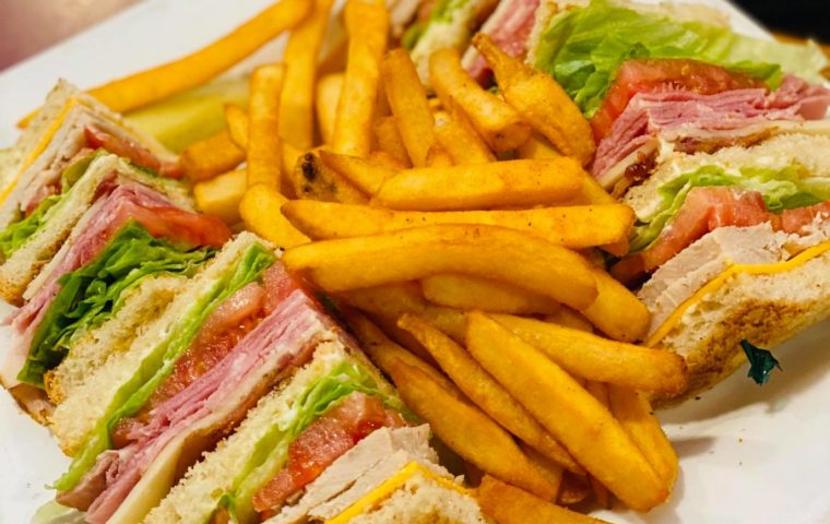 clubhouse sandwich with fries