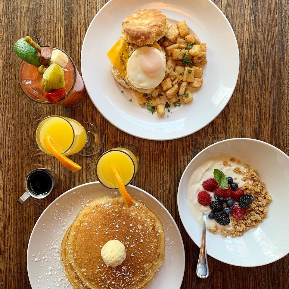 pancakes, breakfast sandwich, Greek yogurt, mimosas and a bloody mary