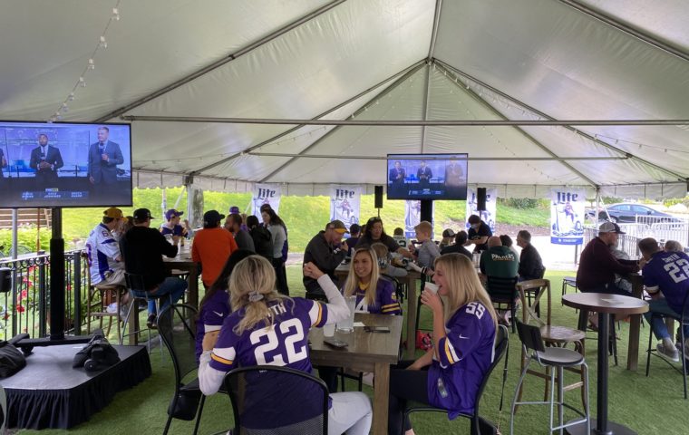 Vikings fans watching the game on the patio at the Park Tavern