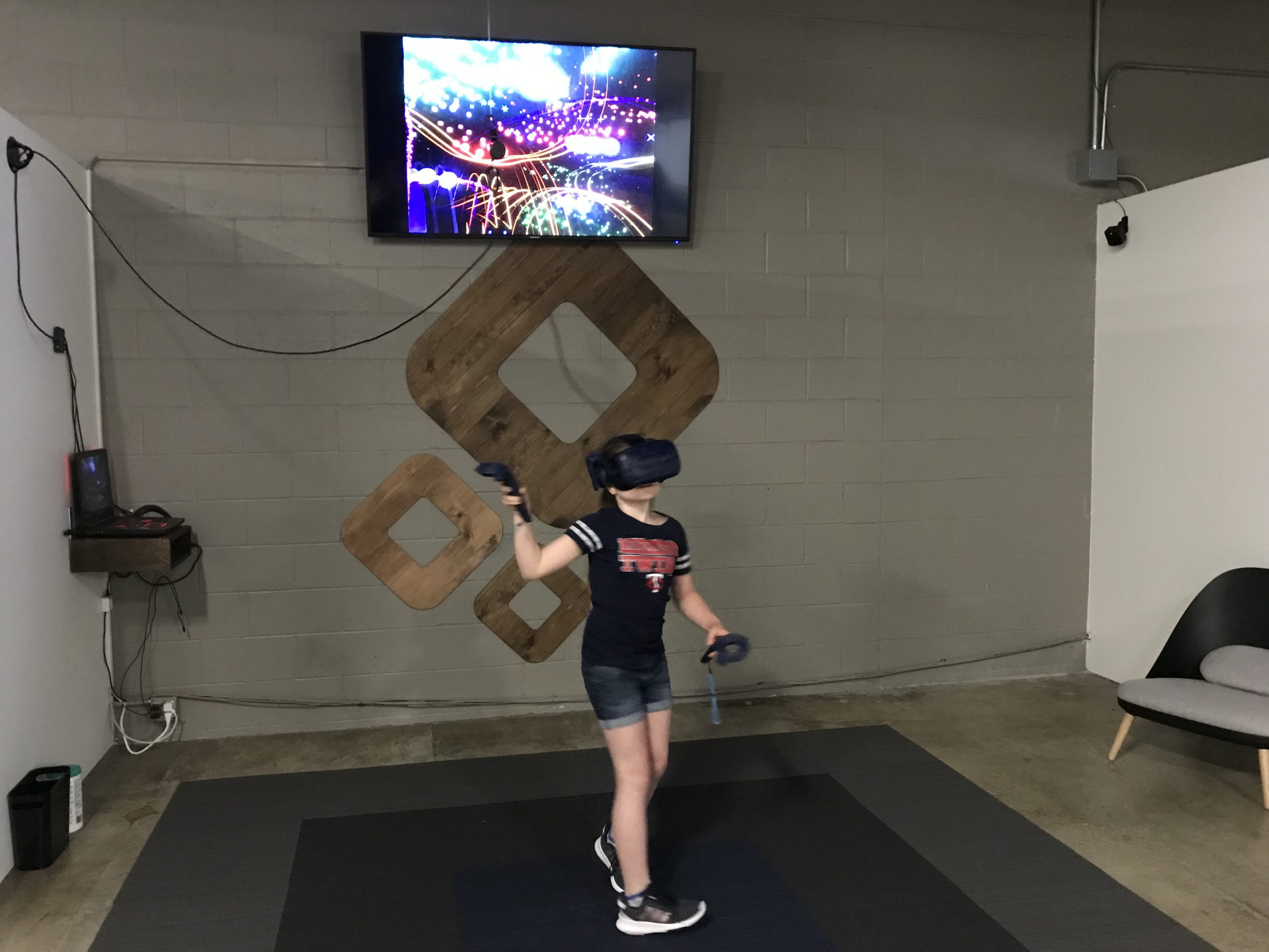 girl playing VR