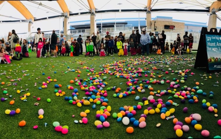 kids waiting to pick up Easter eggs scattered around the ROC