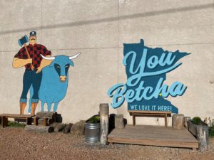 murals featuring Paul Bunyan, Babe the Blue Ox, and You Betcha