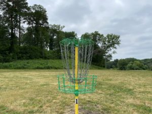 Disk golf scoring basket on the first hole at Theodore Wirth
